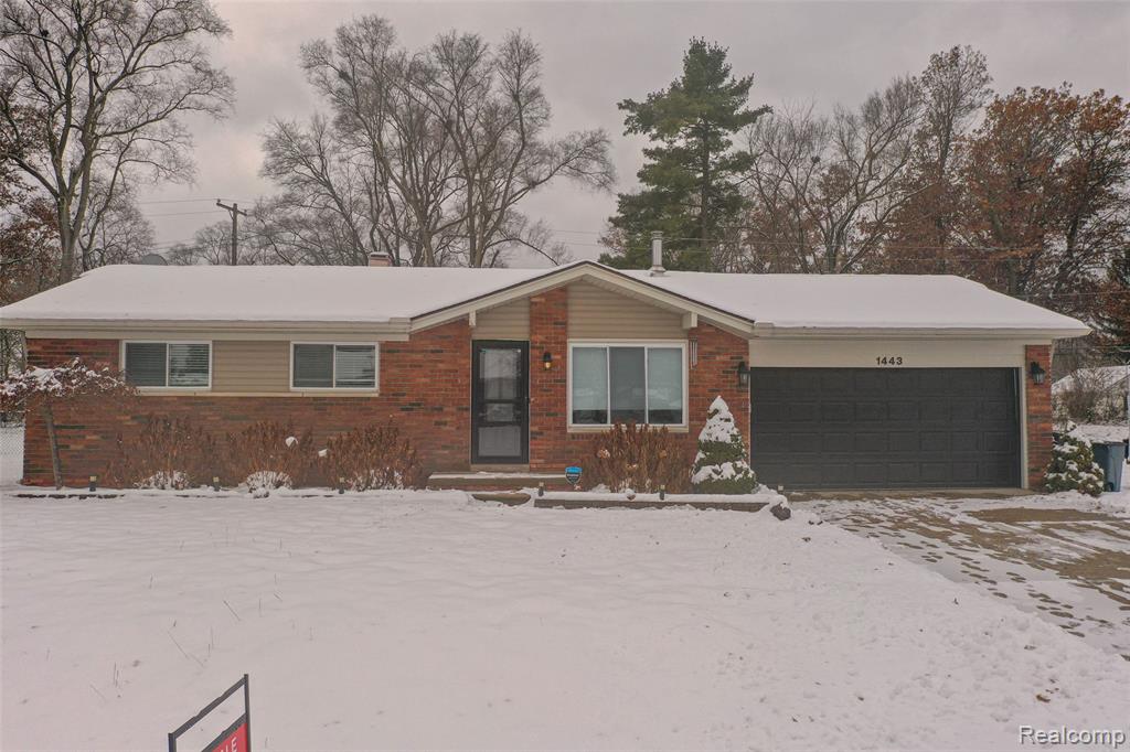 1443 West Drive, Wolverine Lake, MI 48390 — front exterior