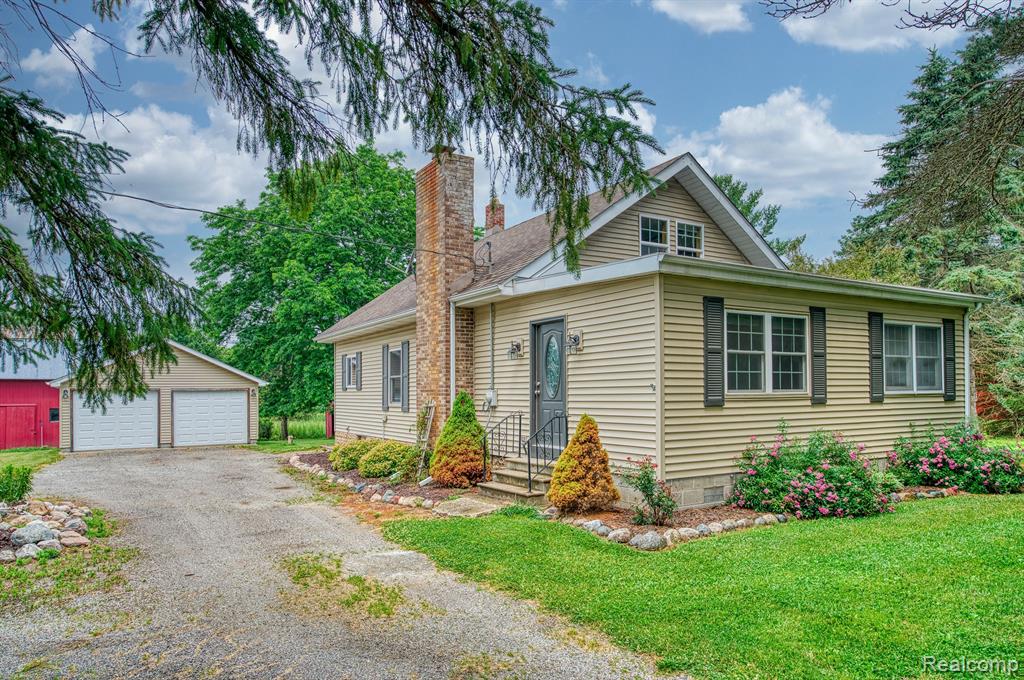 8953 OAK GROVE Road, Howell, MI 48855 — front exterior