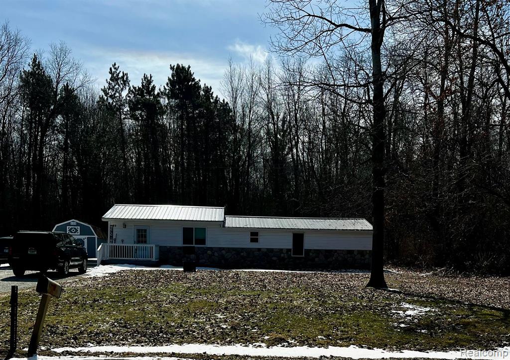 89 W Burnside Road, Fostoria, MI 48435 — front exterior