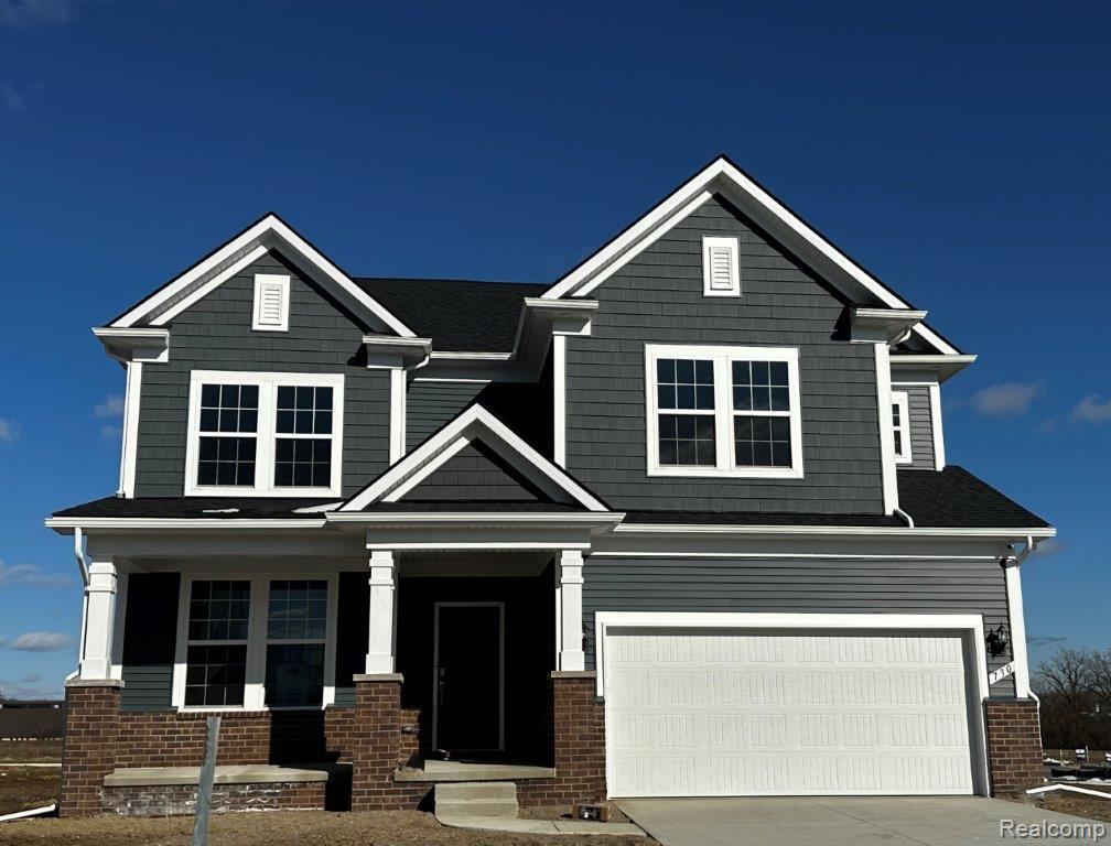 59583 Schuss Gully Drive, New Hudson, MI 48165 — front exterior
