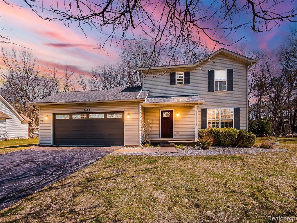 9366 HURON PARK Drive, Brighton, MI 48116 — front exterior