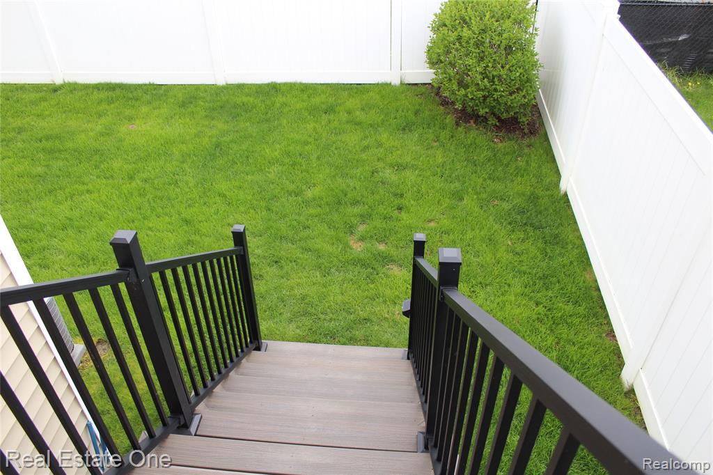 8662 Pinnebog River Drive, Fowlerville, MI 48836 — Photo 24