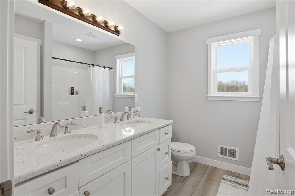 6275 Summerbrooke Circle, Fowlerville, MI 48836 — Photo 21