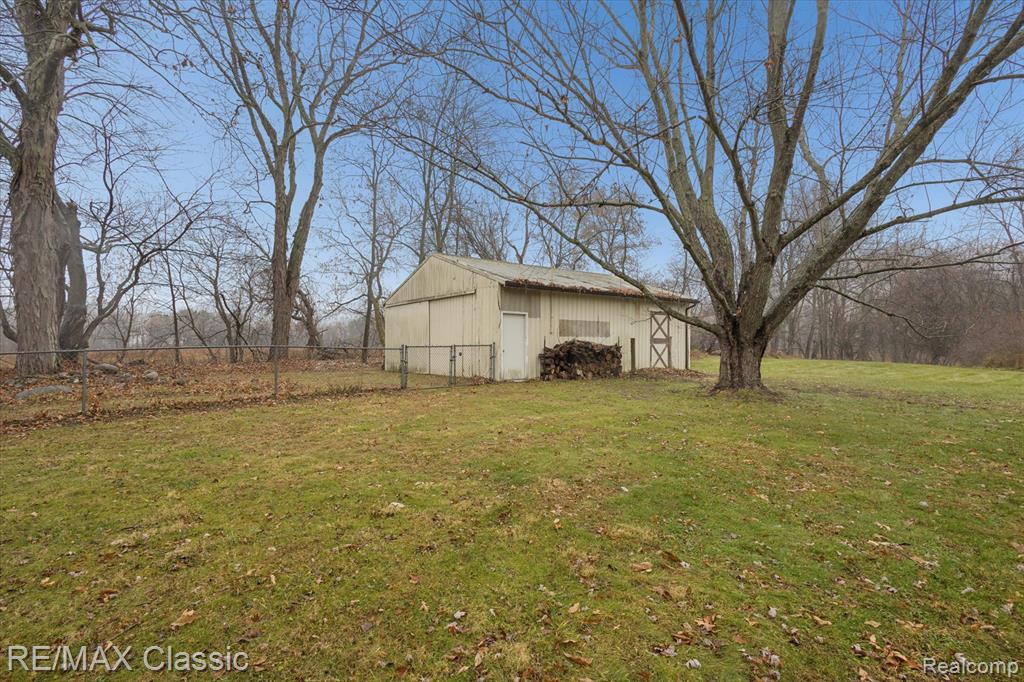5594 Harper Road, Holt, MI 48842 — Photo 38