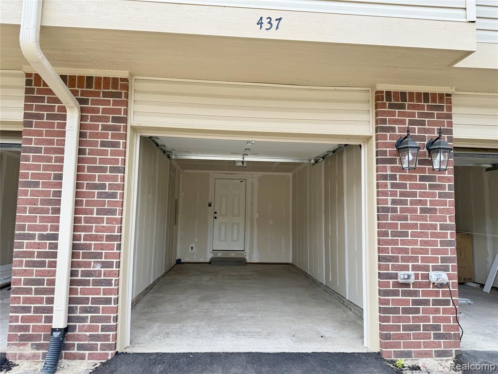 437 Village Drive, Walled Lake, MI 48390 — Photo 24