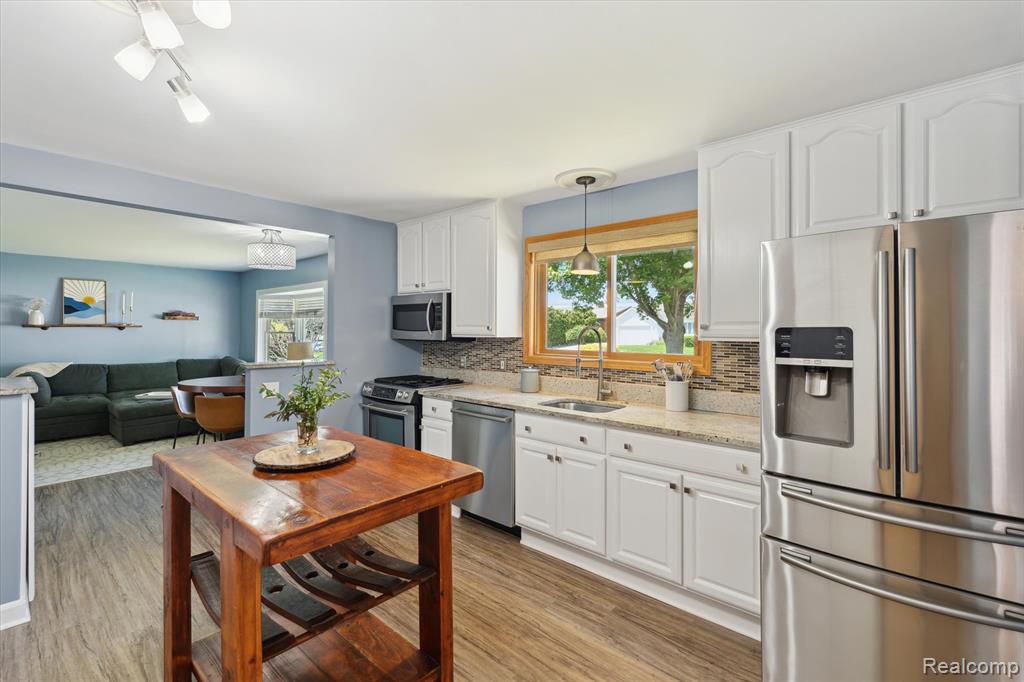 319 Angola Street, Wolverine Lake, MI 48390 — Photo 11