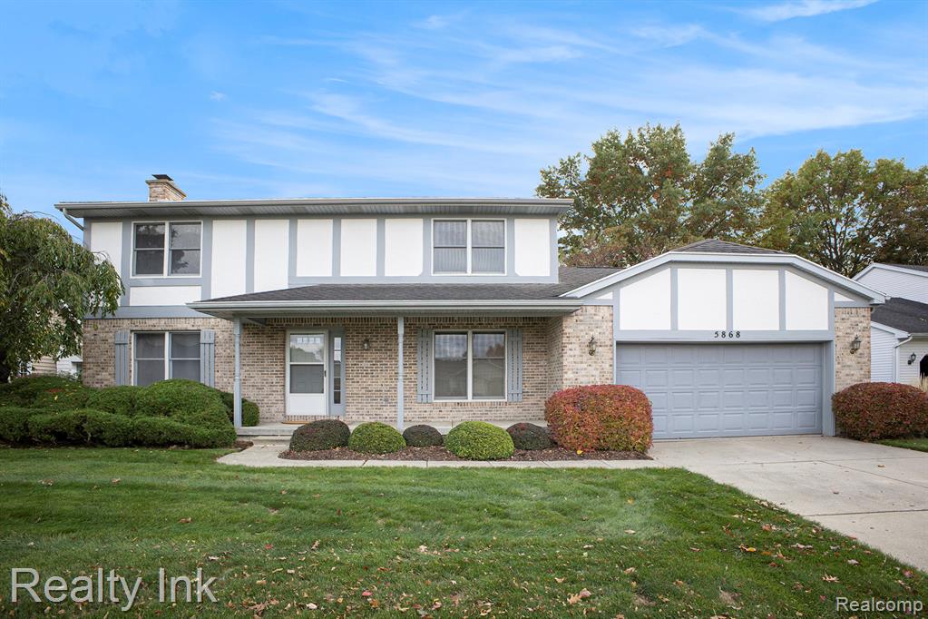 5868 Buttonwood Drive, Haslett, MI 48840 — front exterior