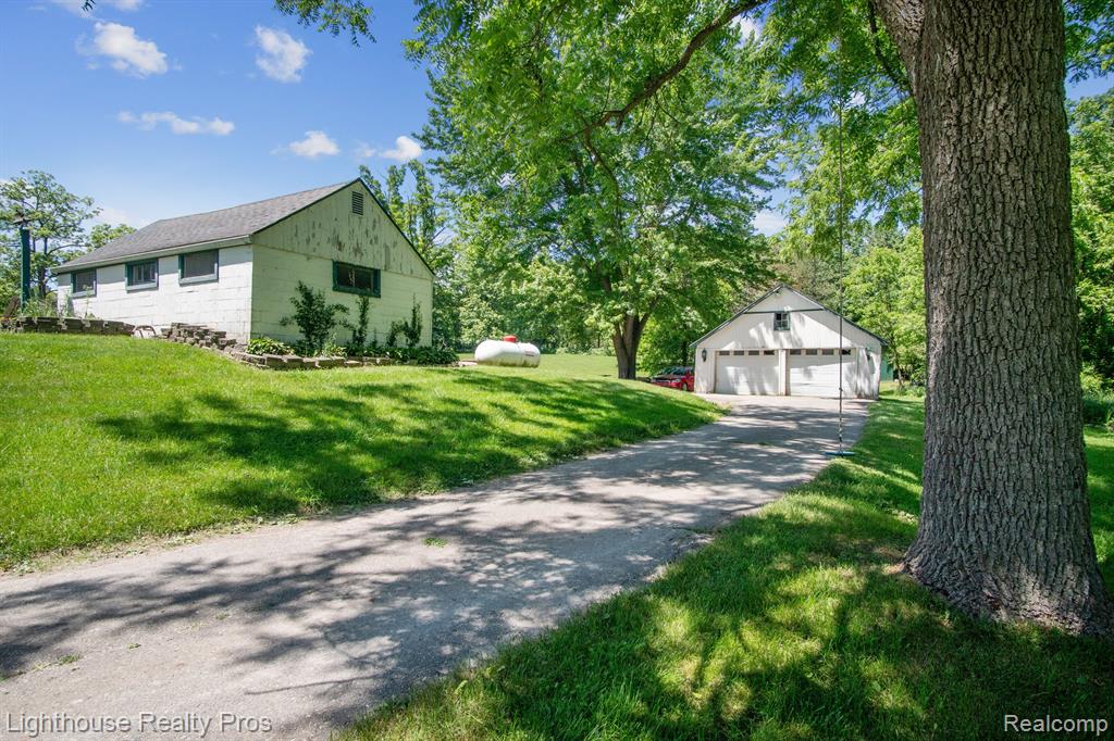 67640 W 8 MILE Road, South Lyon, MI 48178 — Photo 34