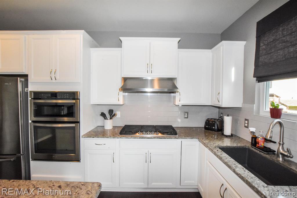 29914 BRAEBURN, New Hudson, MI 48165 — Photo 23