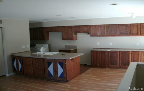 217 NEPTUNE Drive, Walled Lake, MI 48390 — Photo 2