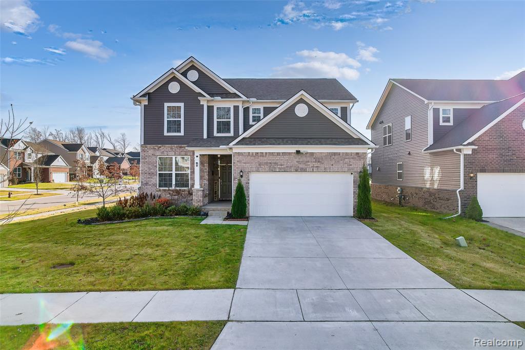 58565 Navarra Drive, South Lyon, MI 48178 — front exterior