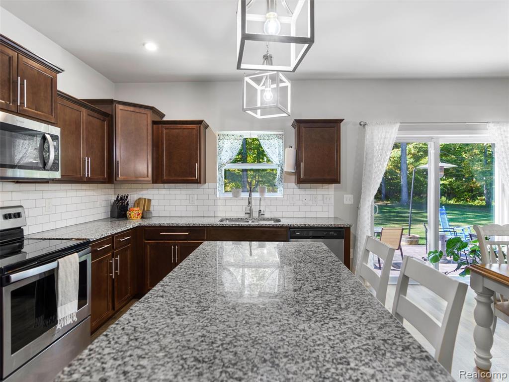 5559 Radiant Avenue, Howell, MI 48855 — Photo 13