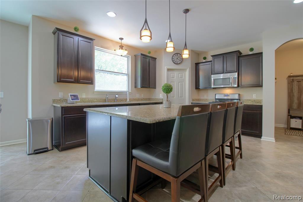 57649 Blossom Valley Trail, New Hudson, MI 48165 — Photo 17