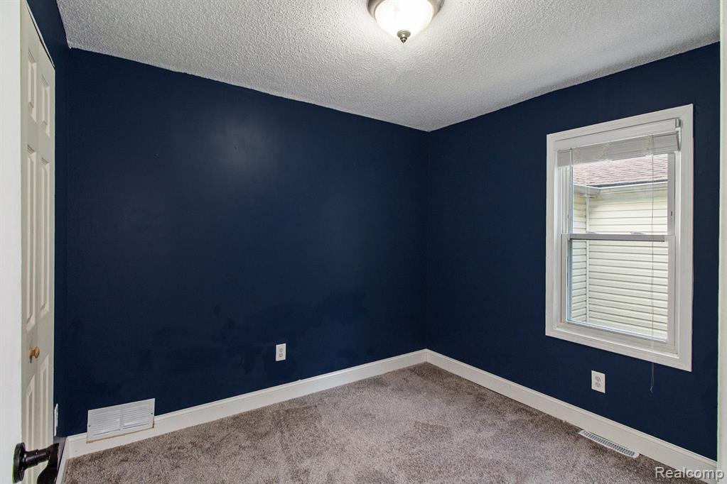 770 Brushwood Drive, Wolverine Lake, MI 48390 — Photo 10