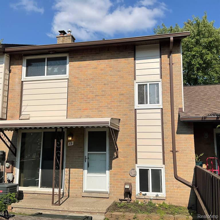 8401 18 MILE Road, 19, Sterling Heights, MI 48313 — front exterior