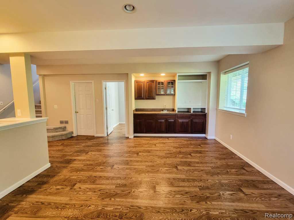 124 Champlain Boulevard, Howell, MI 48843 — Photo 36