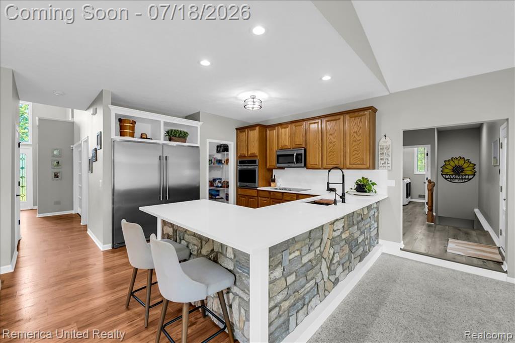 9438 Deer Creek Court, Brighton, MI 48114 — Photo 18