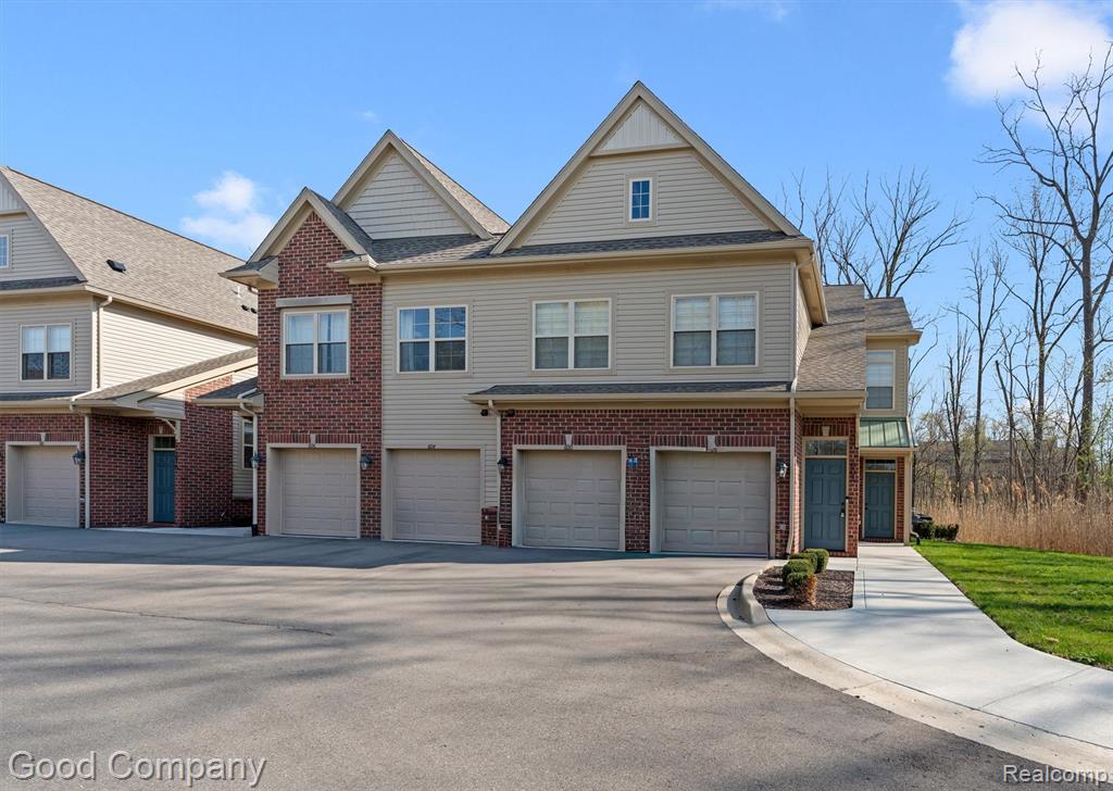 602 Pointe Drive, Walled Lake, MI 48390 — front exterior
