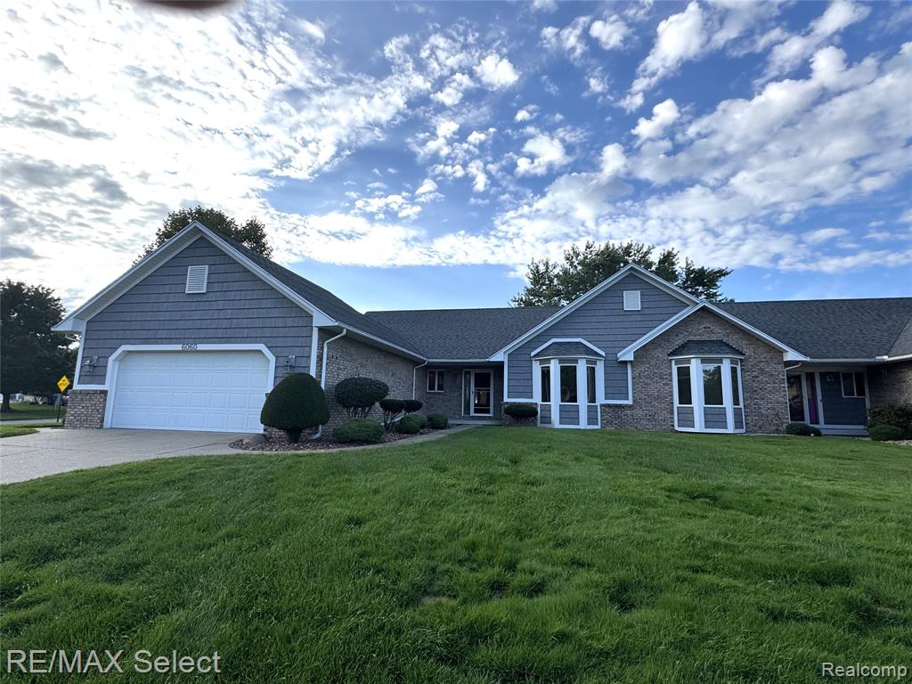 6060 Oak Creek Drive, Swartz Creek, MI 48473 — front exterior