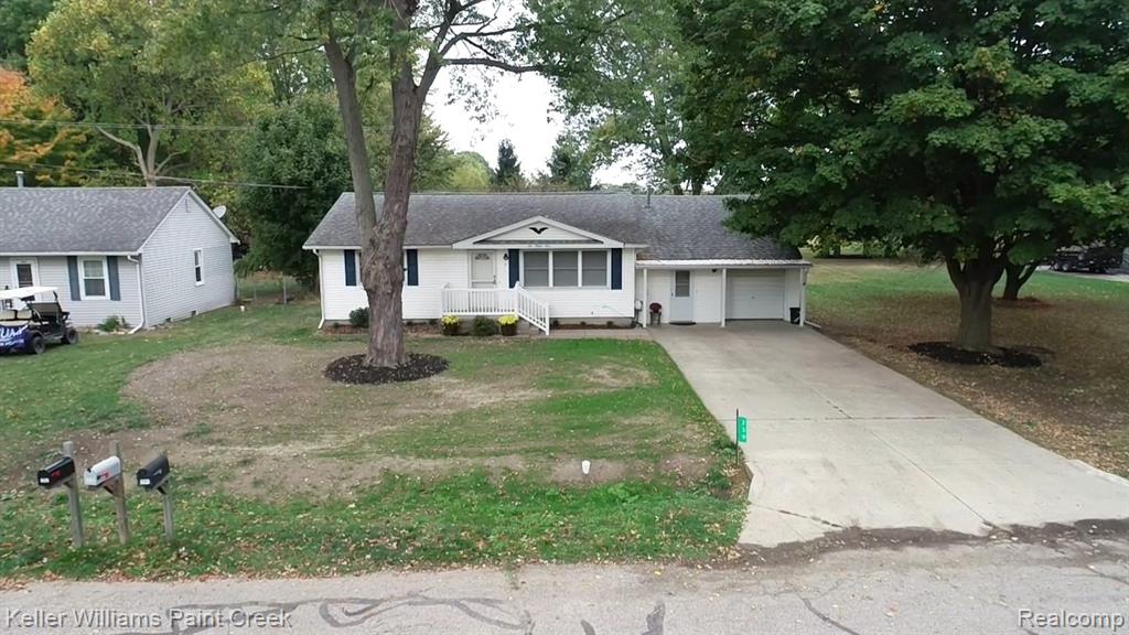 239 Almont Avenue, Almont, MI 48003 — front exterior