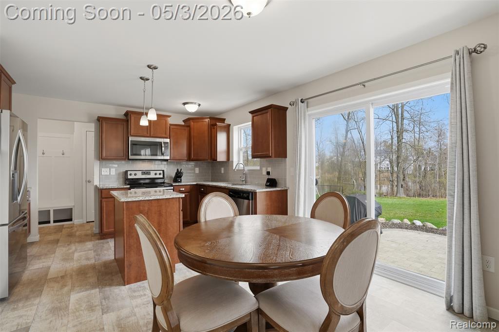 Dining space featuring light wood-style flooring