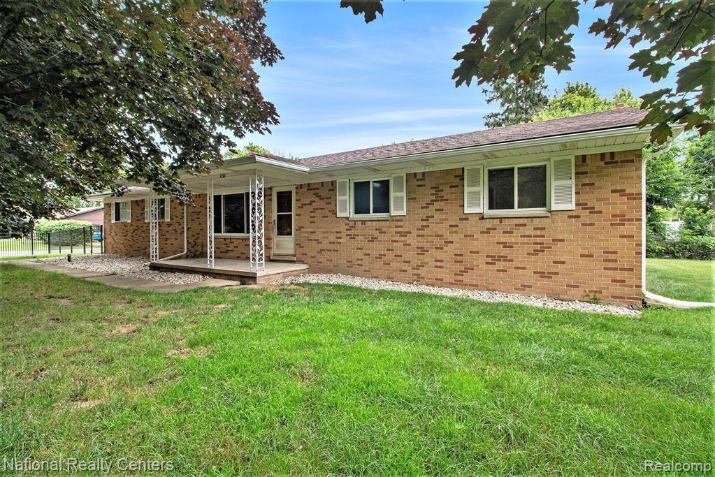 630 W LAKE Street, South Lyon, MI 48178 — front exterior