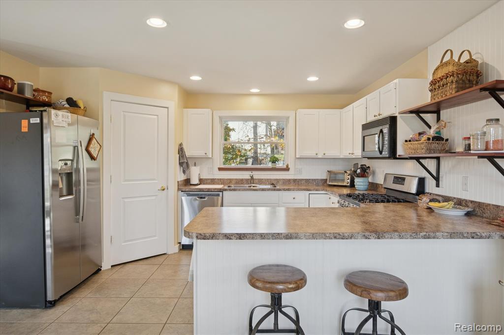 7050 Dibrova Drive, Brighton, MI 48116 — Photo 14