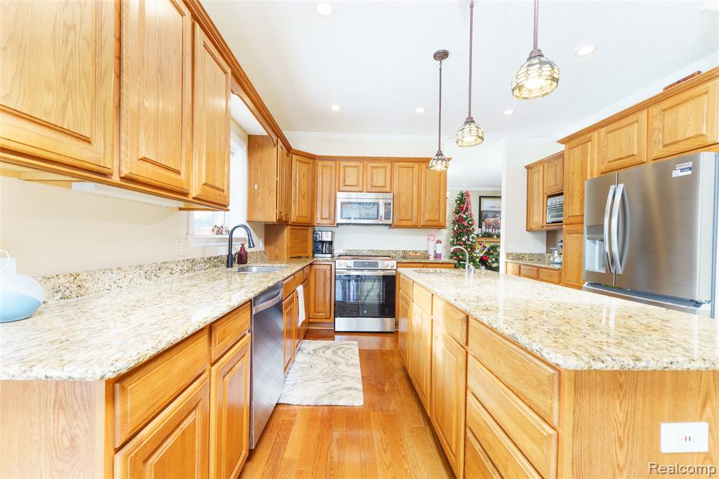4695 Emerald Valley Loop, Fowlerville, MI 48836 — Photo 12