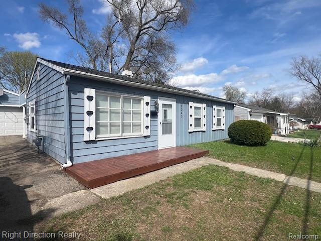 9245 Lee Road, Brighton, MI 48116 — front exterior