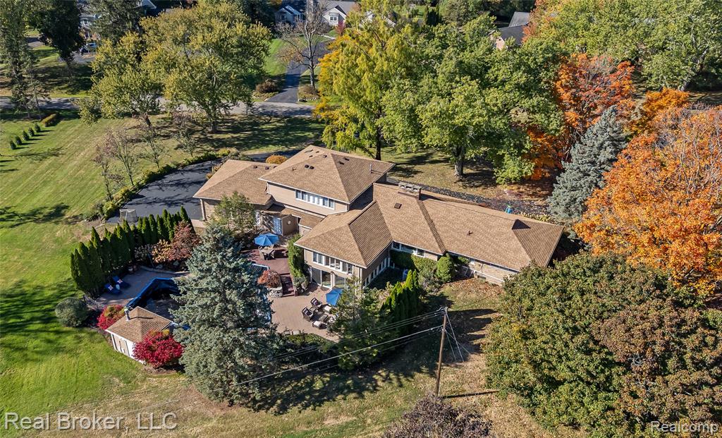 View from above of property featuring a pool