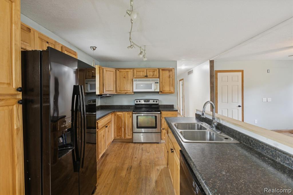 1099 Meadow Road, Tawas City, MI 48763 — Photo 7