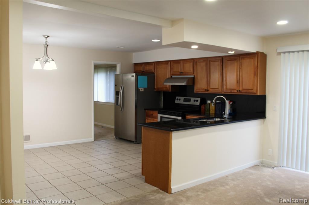 6586 CARRIAGE HILLS Drive, Canton, MI 48187 — Photo 13