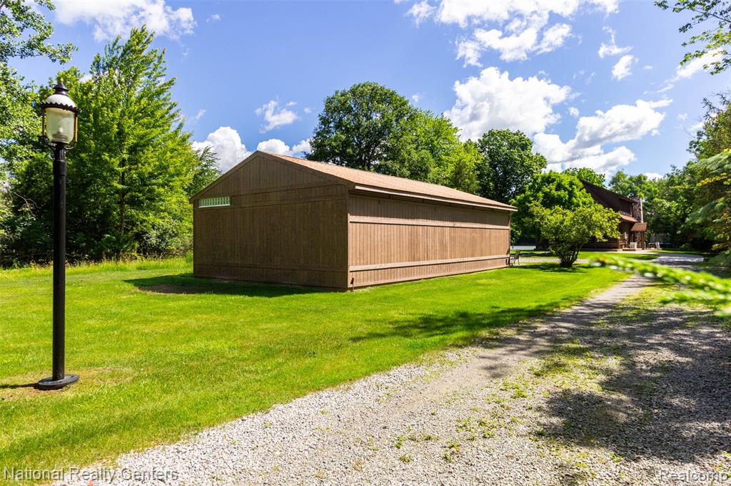 8706 Buckland Drive, South Lyon, MI 48178 — Photo 48