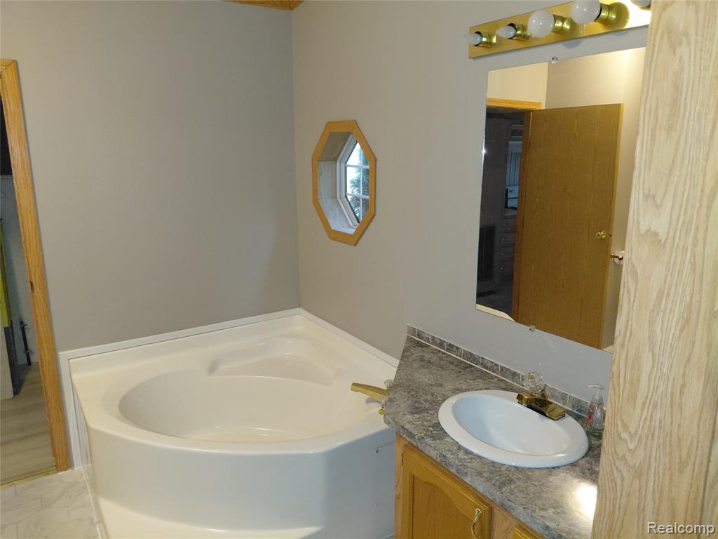4740 Spring Creek Drive, Howell, MI 48843 — Photo 8
