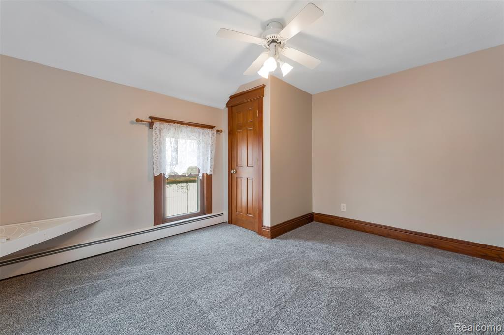 128 Clarence Street, Holly, MI 48442 — front exterior