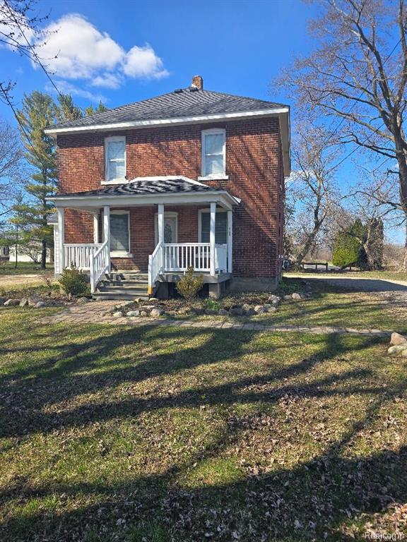 71271 MCVICAR Road, Bruce, MI 48065 — front exterior