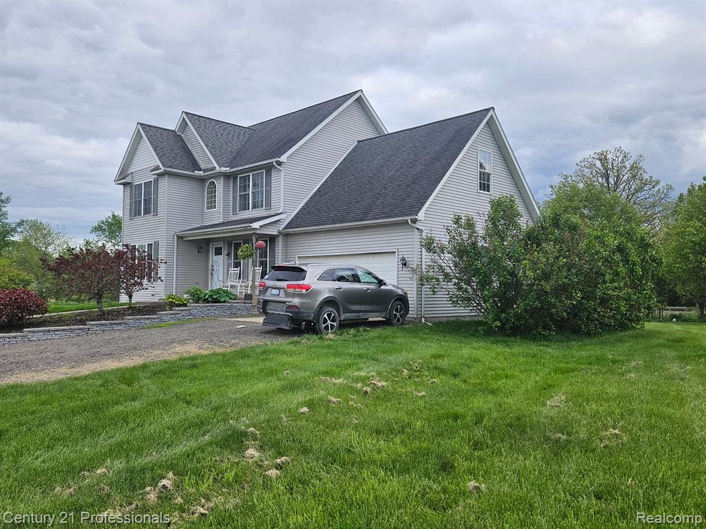 1451 ASHLYN Court, Fowlerville, MI 48836 — Photo 4