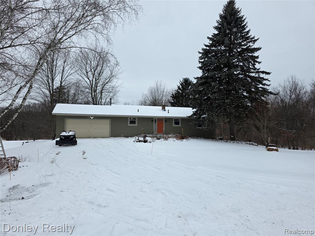 6453 Mack Road, Howell, MI 48855 — front exterior