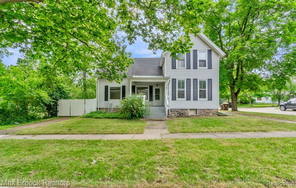 702 S BARNES Street, Mason, MI 48854 — front exterior