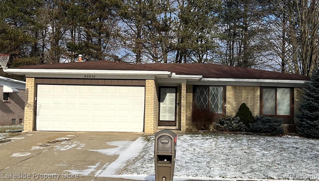 40430 Shakespeare Drive, Sterling Heights, MI 48313 — front exterior