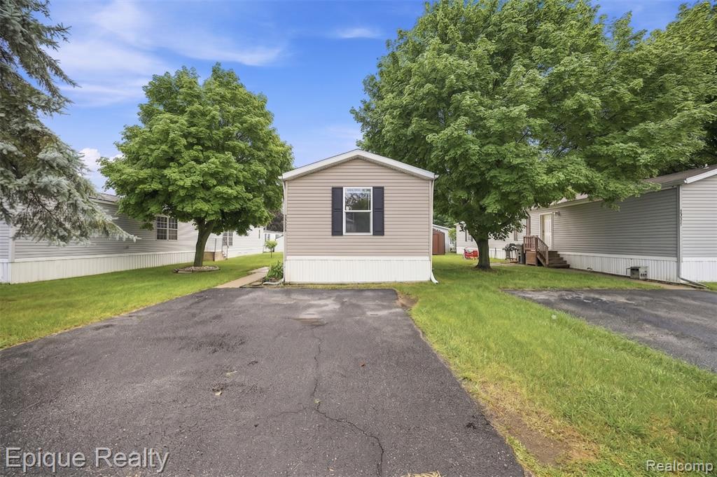 48580 Pineview Drive, Shelby Twp, MI 48317 — front exterior