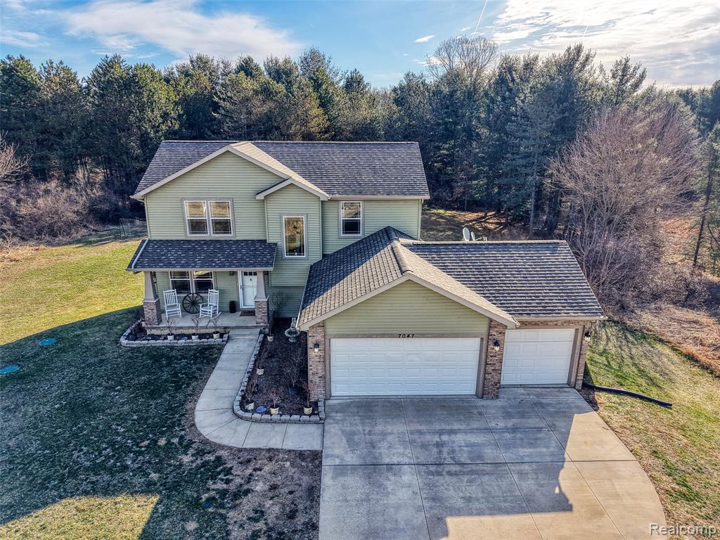 7047 Bennington Greens Drive, Owosso, MI 48867 — Photo 4