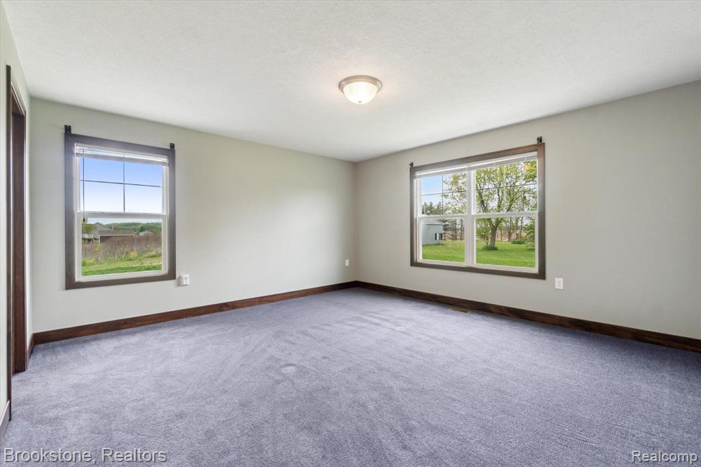 4050 CAYMAN Drive, Dewitt, MI 48820 — Photo 49