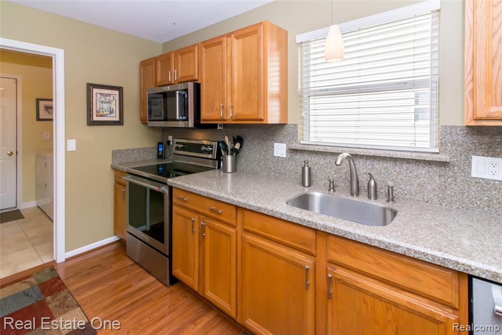 568 Woodhaven Drive, Walled Lake, MI 48390 — Photo 25