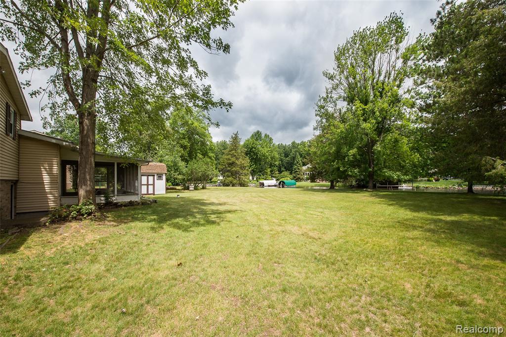 1165 Camelot Drive, Pinckney, MI 48169 — Photo 33