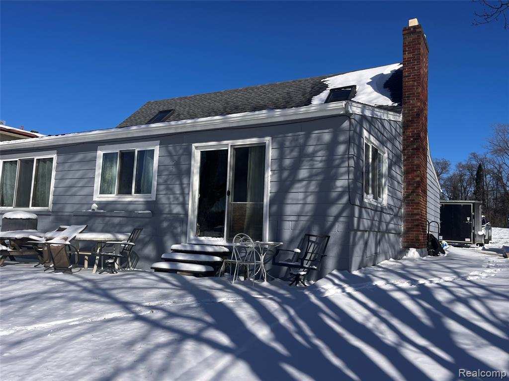 8252 Woodland Shore Drive, Brighton, MI 48114 — front exterior
