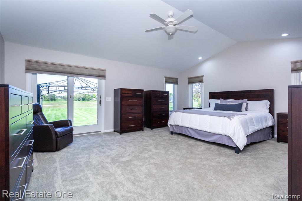 Primary Bedroom with sliding door access to backyard patio