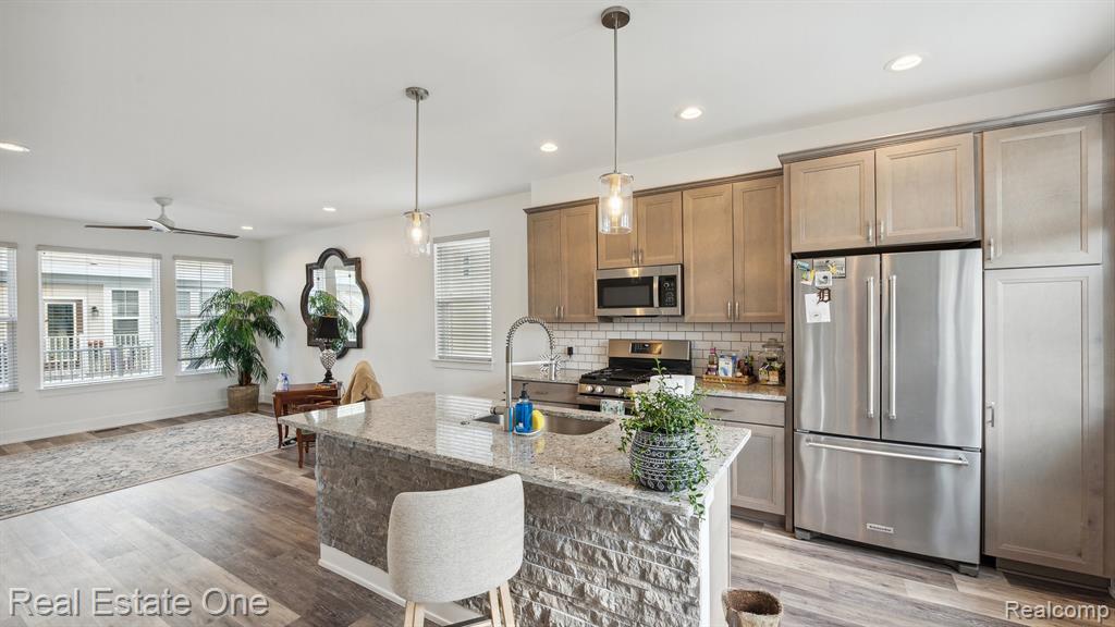 131 MONUMENT Lane, Wixom, MI 48393 — Photo 5