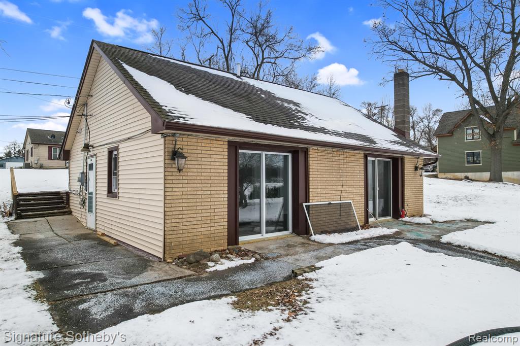 8041 GRAND RIVER Road, Brighton, MI 48114 — front exterior