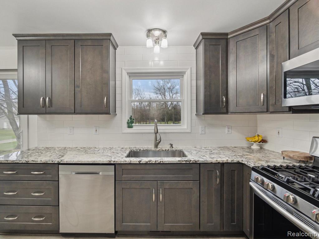 5469 HOGBACK Road, Fowlerville, MI 48836 — Photo 9